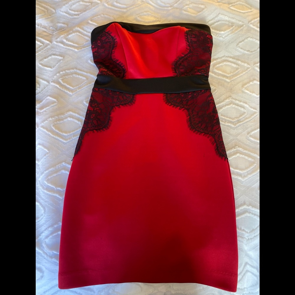 Fredricks Sexy, lipstick red strapless, black eyelid lace dress
